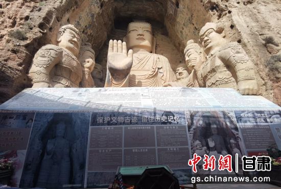 時下，中國“石窟鼻祖”天梯山石窟第13窟大佛足部與局部危巖體搶救性保護項目正在施工。圖為施工現(xiàn)場。陳曉斌 攝
